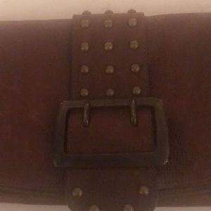 NWT brown or white clutches with bronze detail!